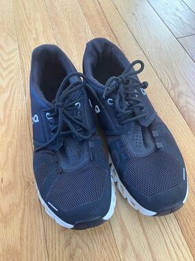 On Running women’s Athletic Lace-Up Shoes in Black and White